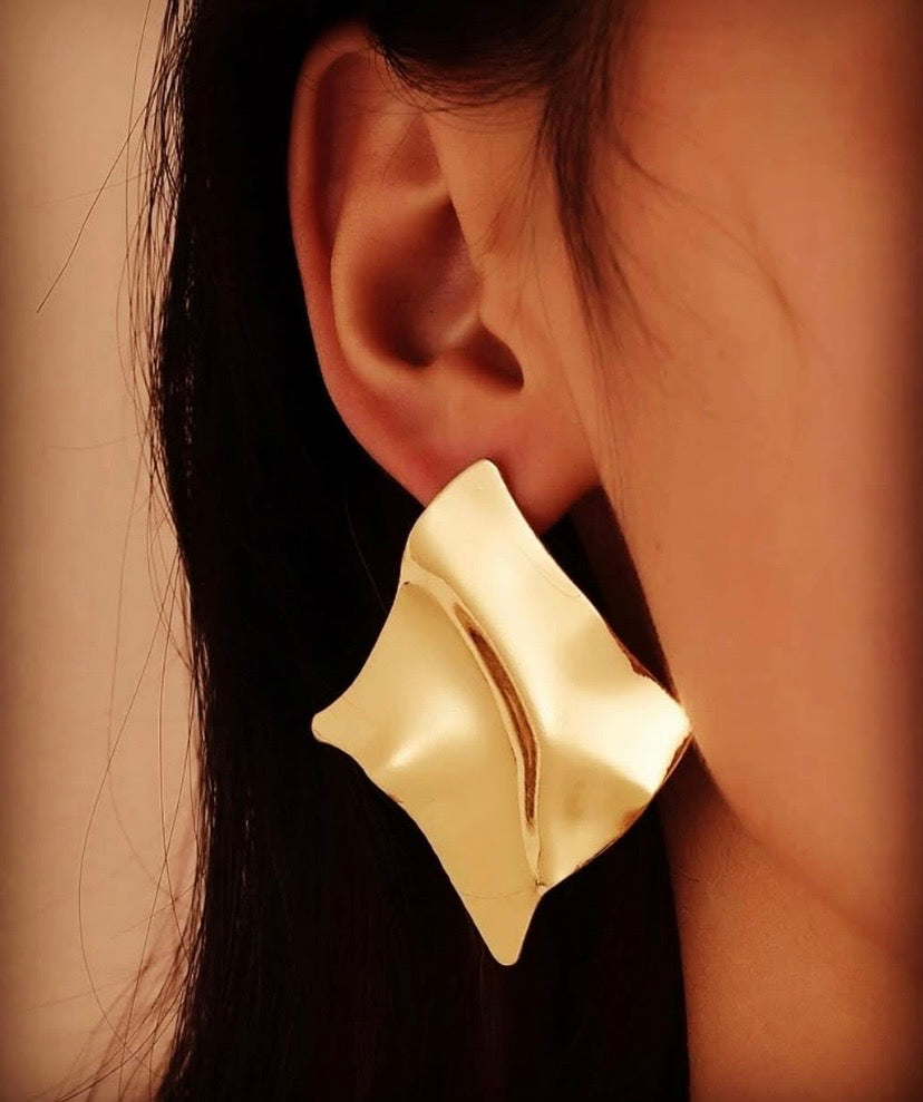 Boucle d’oreilles en forme irrégulière